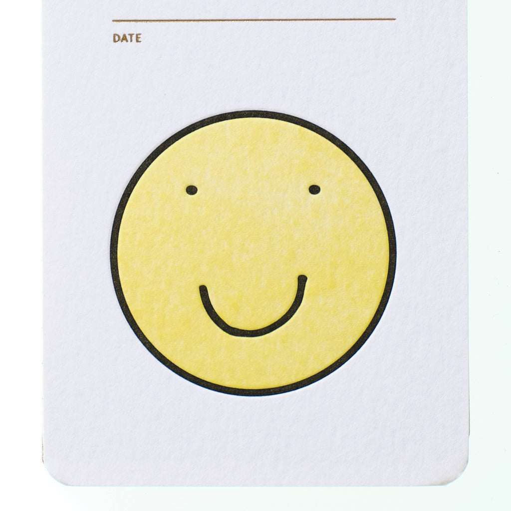 reporter notebook - smiley face