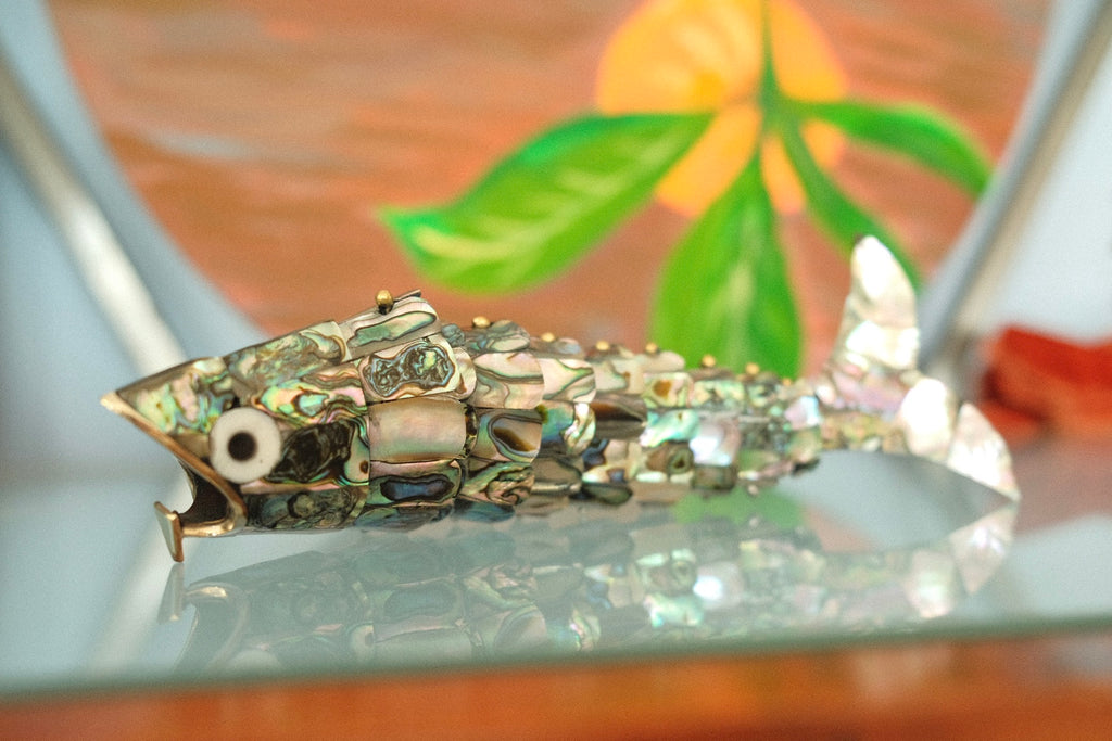articulated abalone fish bottle opener