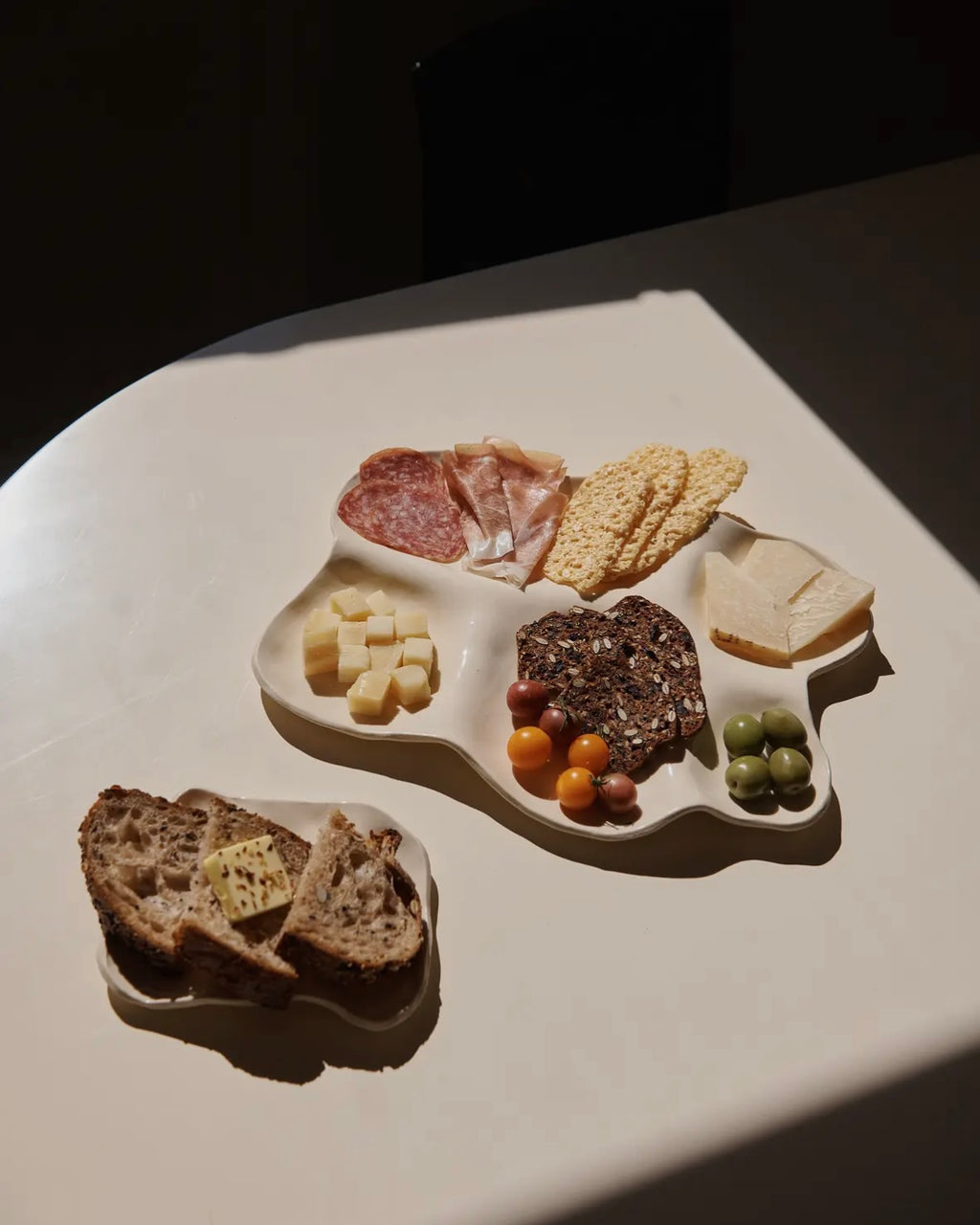 large white ceramic charcuterie board