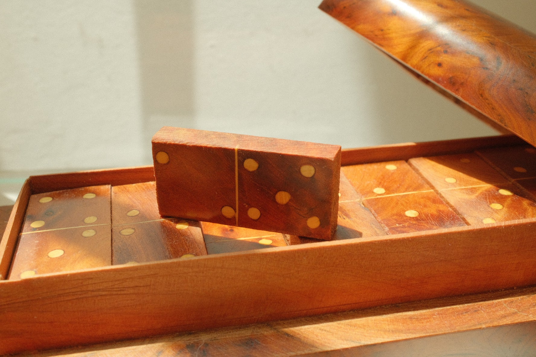 vintage wooden domino set in burl wood case
