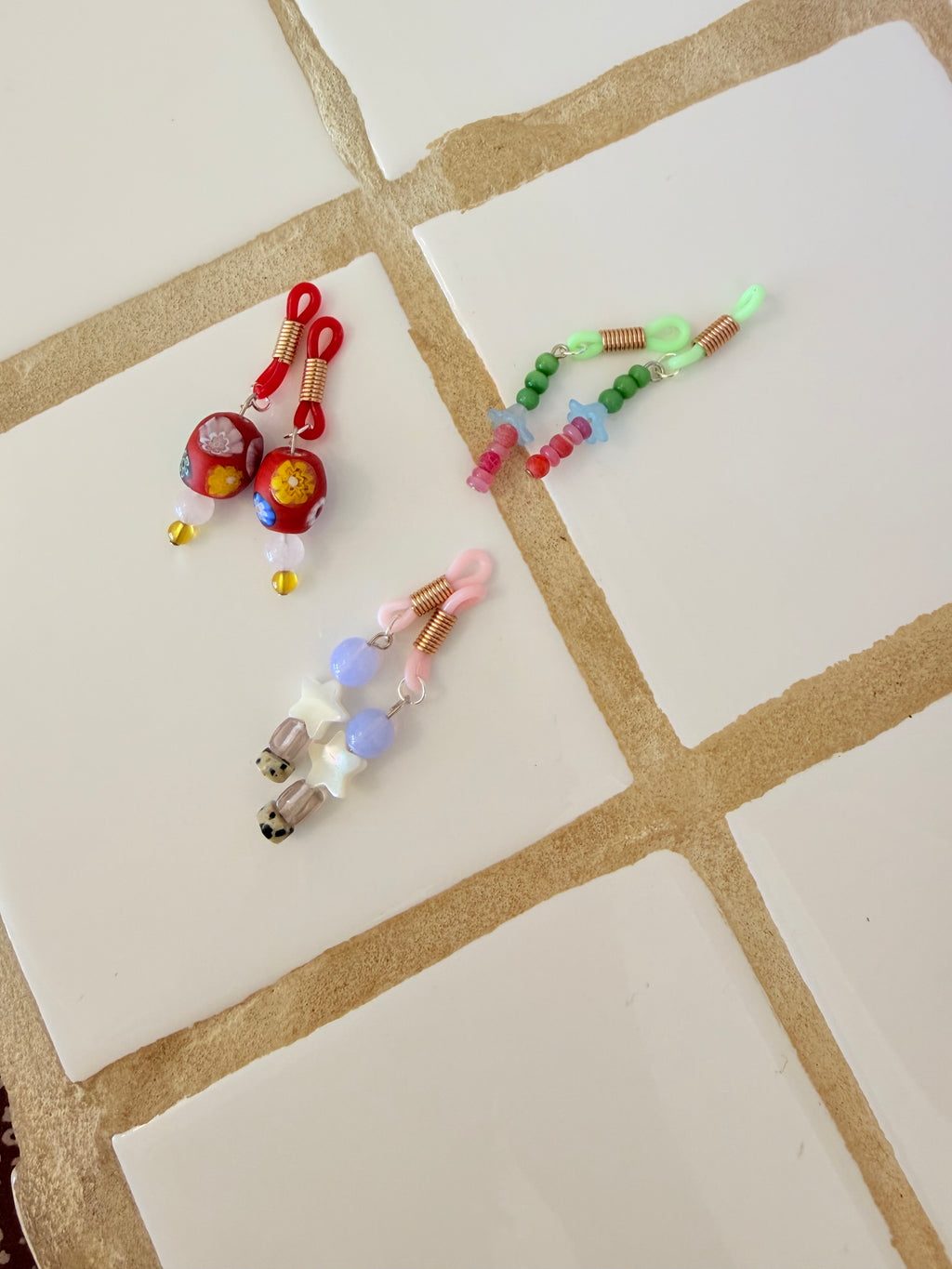 sunglass / earbud charm (set)