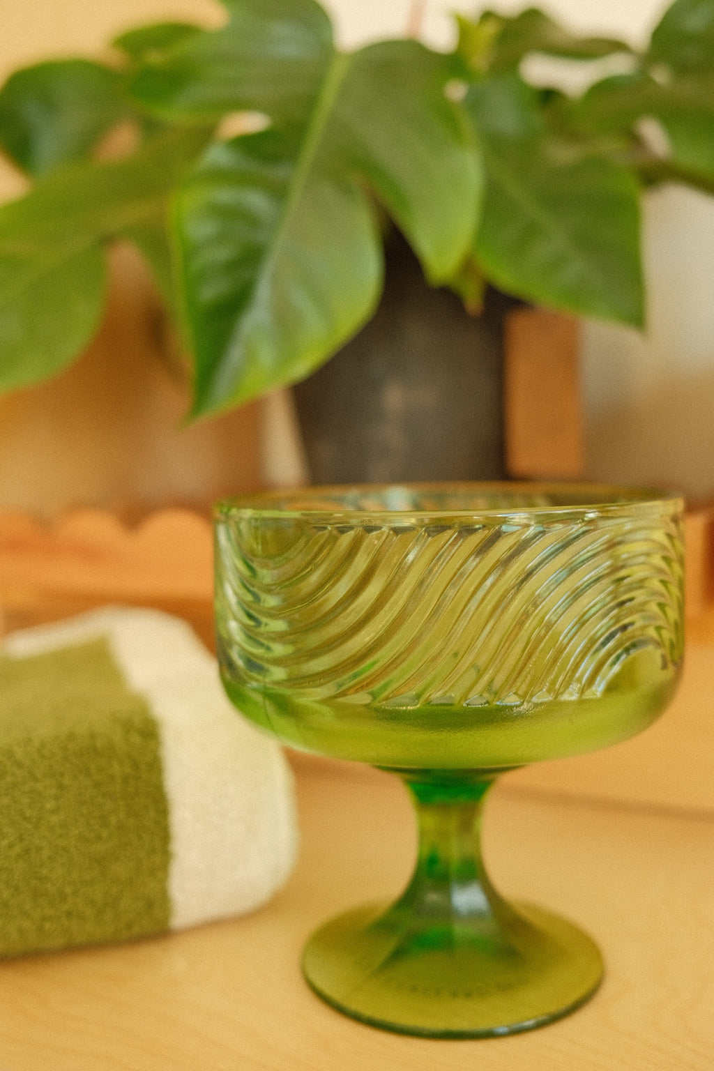 vintage green glass small pedestal bowl