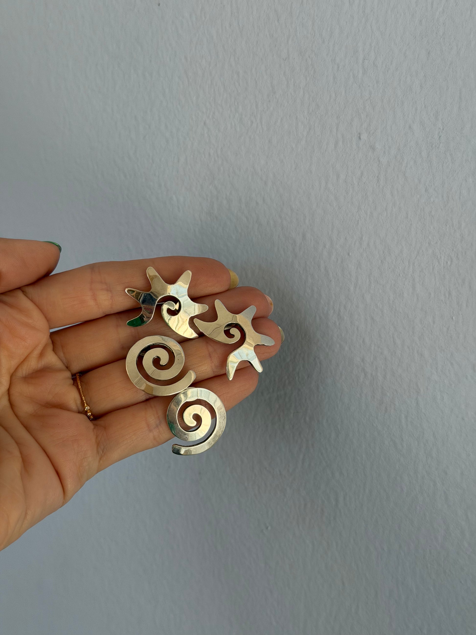 silver swirly earrings