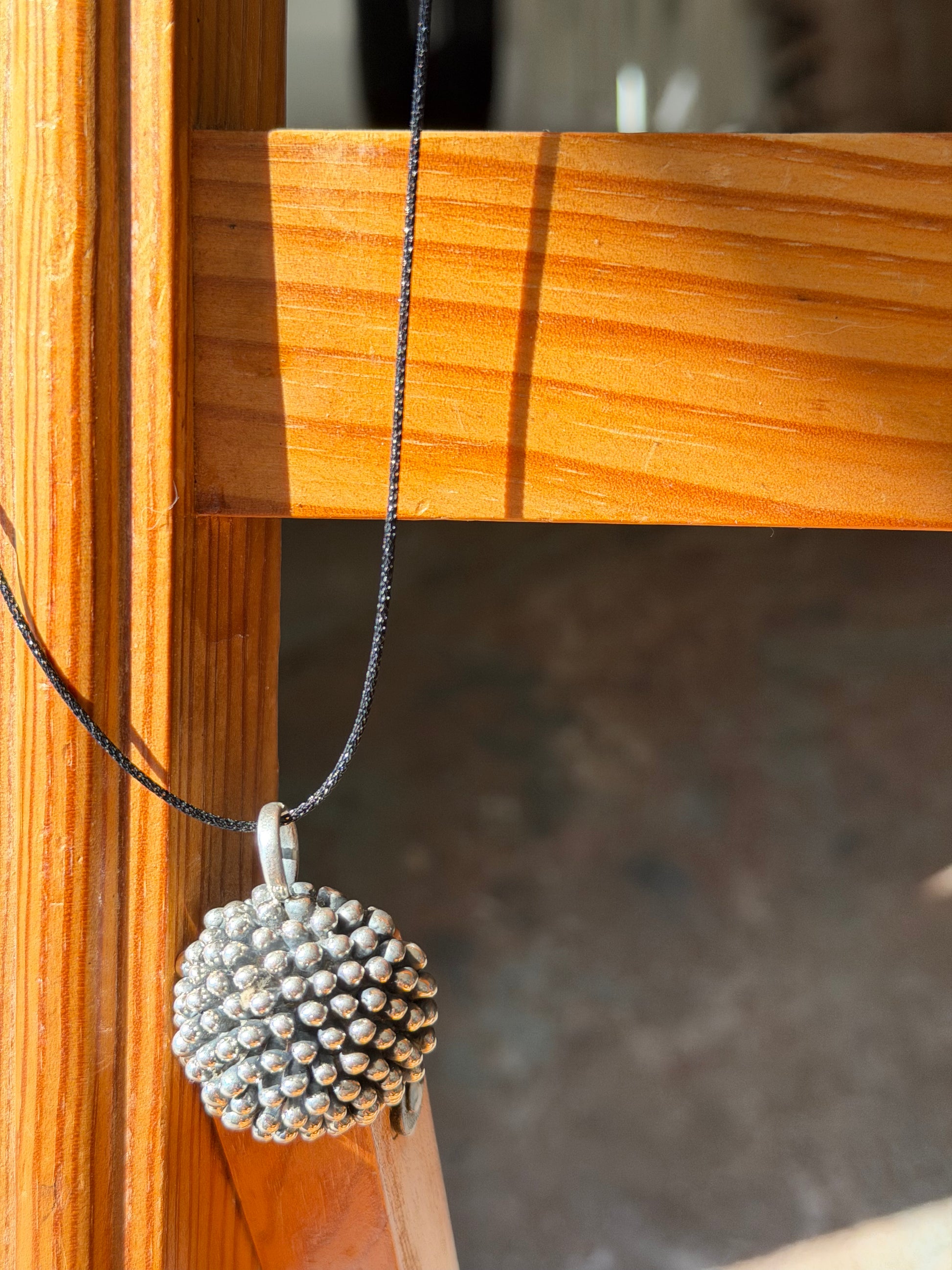 silver pom flower necklace