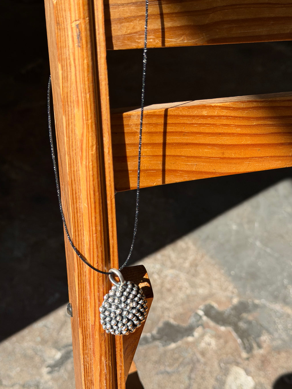 silver pom flower necklace