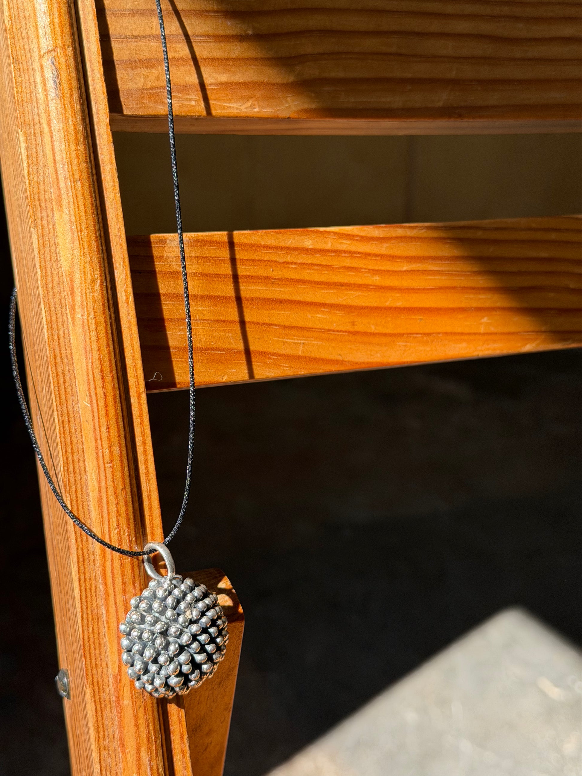 silver pom flower necklace