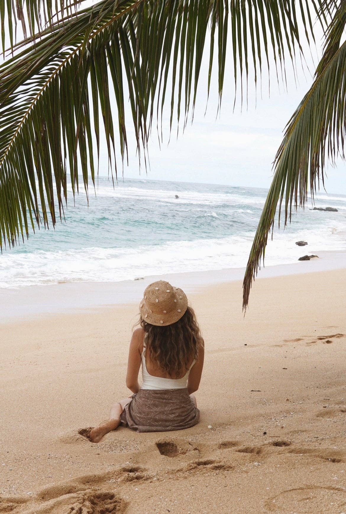 puka dot- cowry shell raffia bucket hat