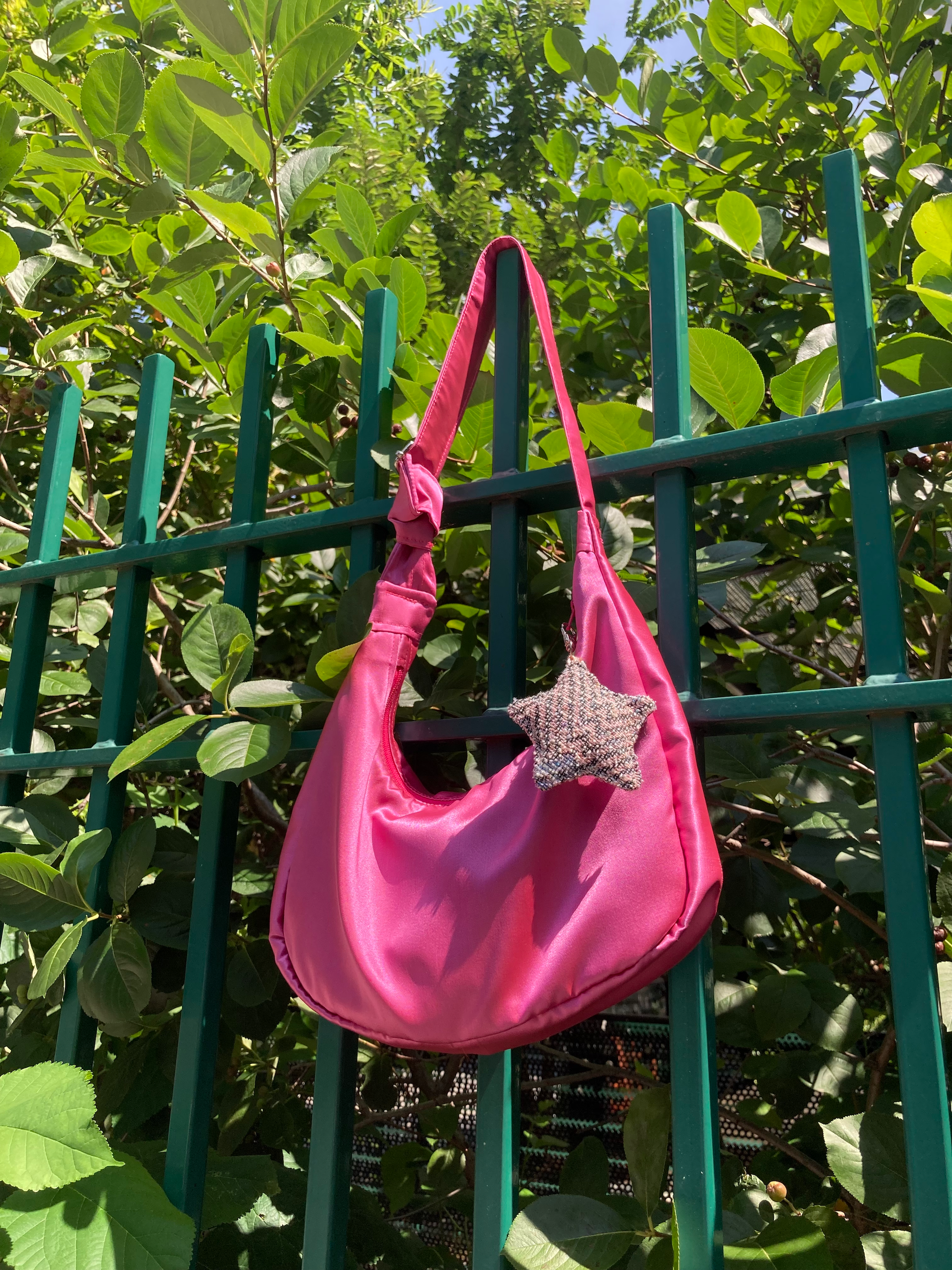 iridescent light blue bag charm