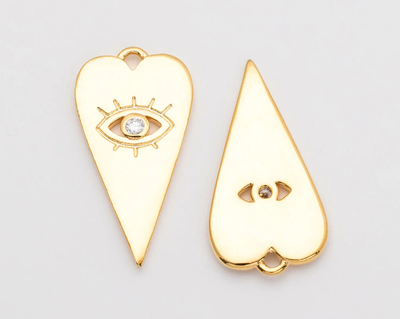 flat evil eye heart charm