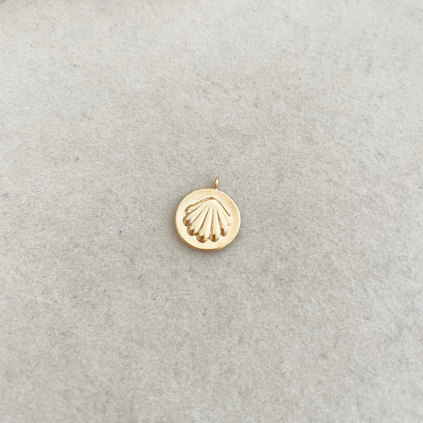 seashell coin charm