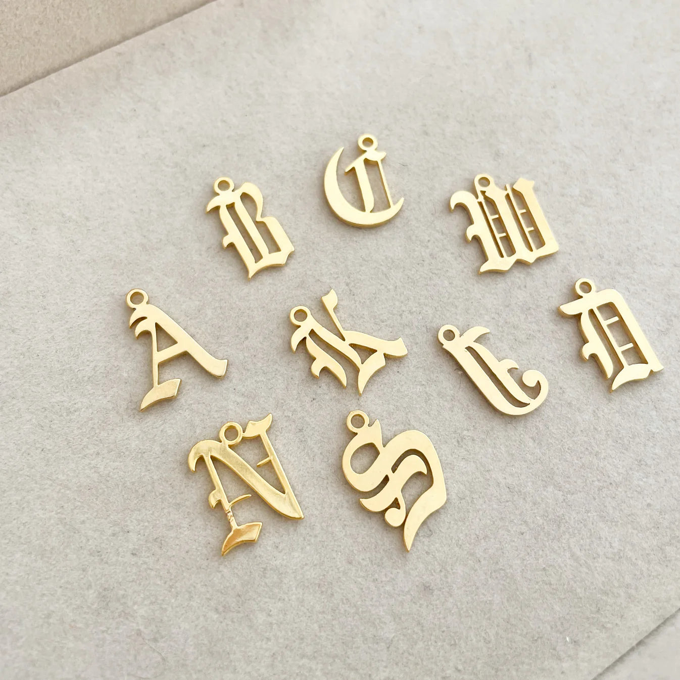 old english letter charm