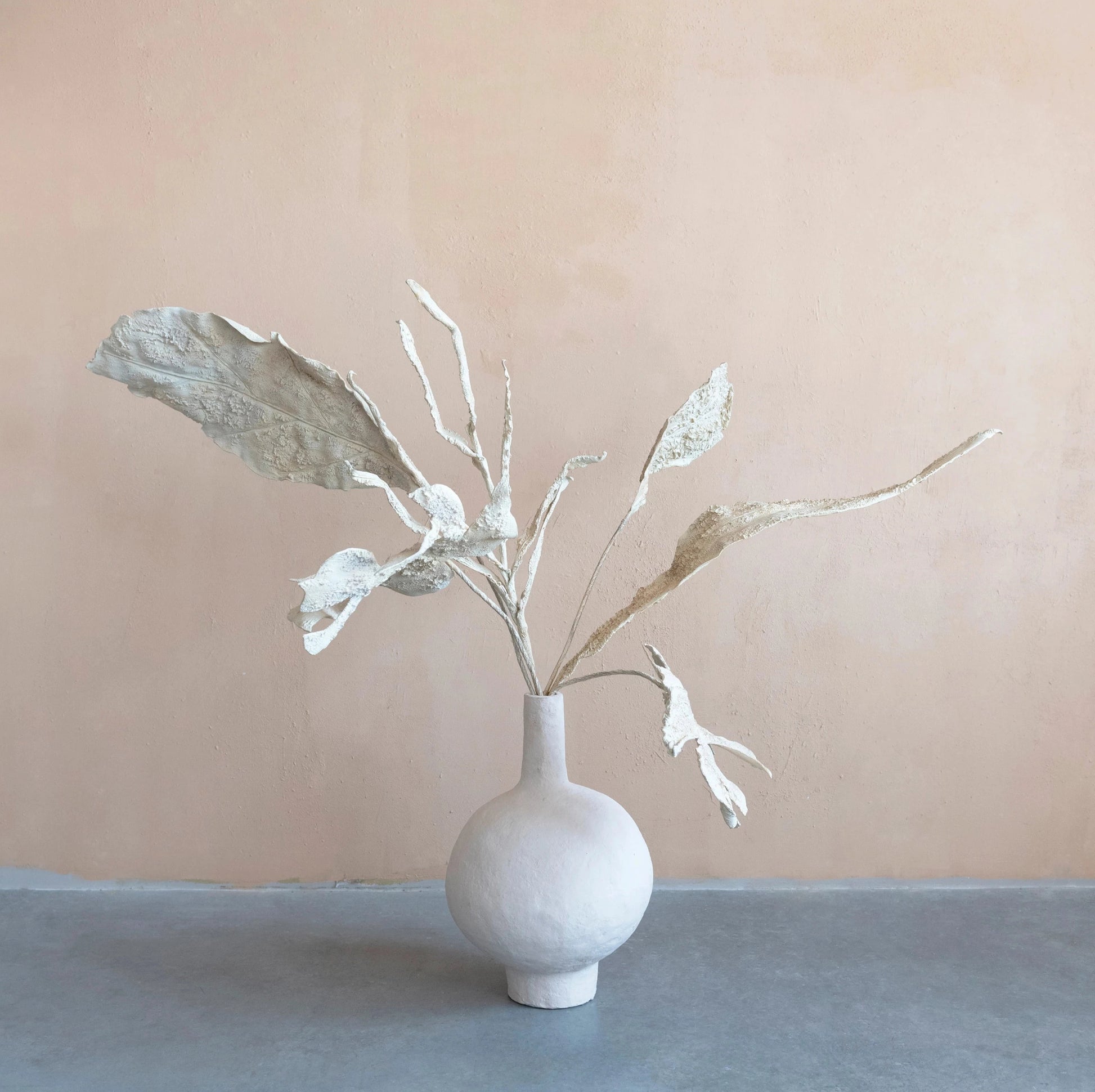 sand colored faux plaster botanical leaf