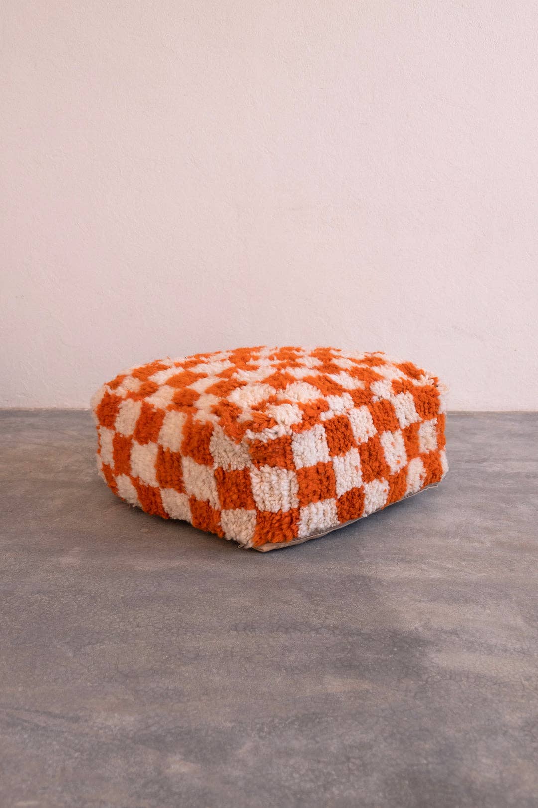 checkered moroccan pouf | orange
